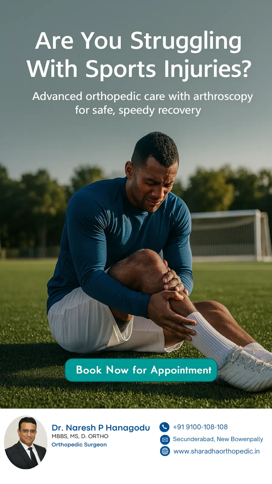 Young footballer holding an injured ankle on the pitch